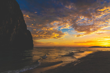 Obraz na płótnie Canvas Sunset at beach sea sky clouds twilight time
