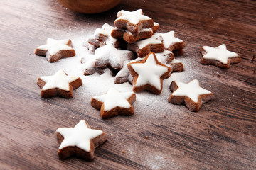 Christmas homemade gingerbread cookies with sugar powder. star cookies