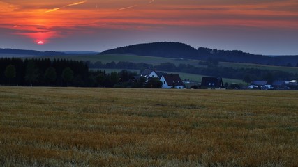 Obraz premium sonnenuntergang in auerbach im erzgebirge