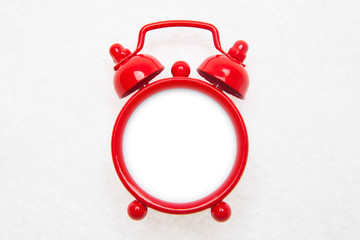 Blank red alarm clock on the white background