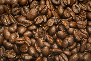 Close up of roasted coffee beans background.