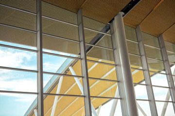 windows in modern office building with view on sky