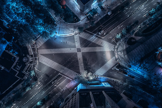 Aerial drone view on city intersection during night