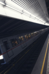 Subway Train Passing By The Station. Motion Blur Effect