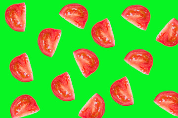 Slice the tomato on a bright green background