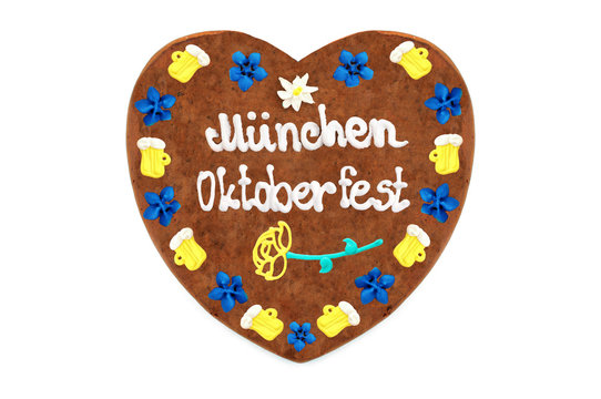 Oktoberfest Muenchen Gingerbread heart w(engl. October festival Munich) ith white isolated background (Germany).