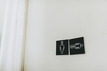 Symboles wc homme et femme