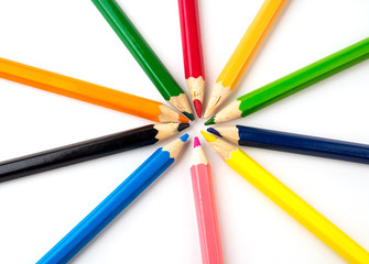 Naklejka premium Colored pencils on white background. Stationery