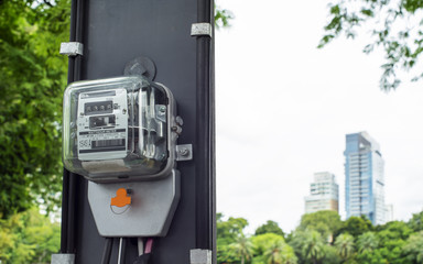 An electric meter in the park