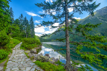 Mountain landscape with hiking trail and view of beautiful lakes