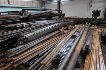 Warehouse of a metal bar of pipes