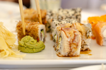 Sushi in hand restaurant in a restaurant seafood fresh roll