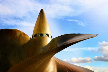 propeller from a large ship on background blue sky