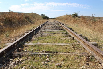 Obraz premium abandoned and forgotten train track without trains