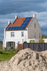 houses with solar panels on the roof