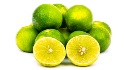 Naklejka na ściany i meble Fresh lime or lemon on white background