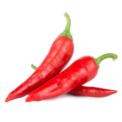 Three Red hot chili peppers isolated on a white background