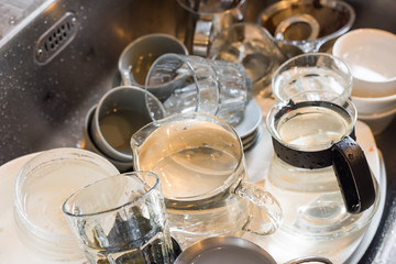 dirty dishes in sink