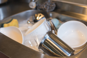 dirty dishes in sink