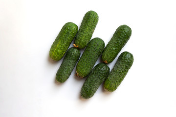 Fresh green cucumbers isolated on white background from a high angle view
