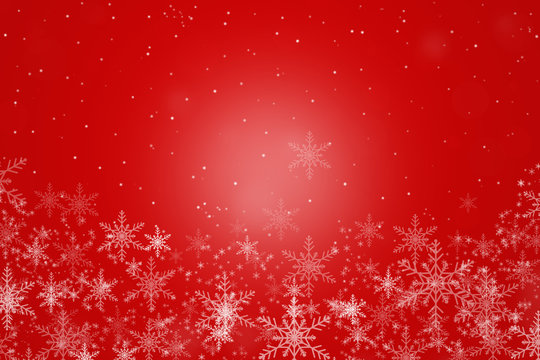Beautiful white snowflakes on a  red background.