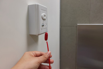 Button for help in hospital toiler