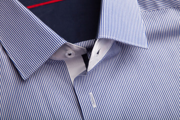 Piece of cotton shirt. Pure cotton fabric. Classic men's shirt collar detail 