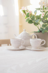 Fototapeta na wymiar Tea set on the round table