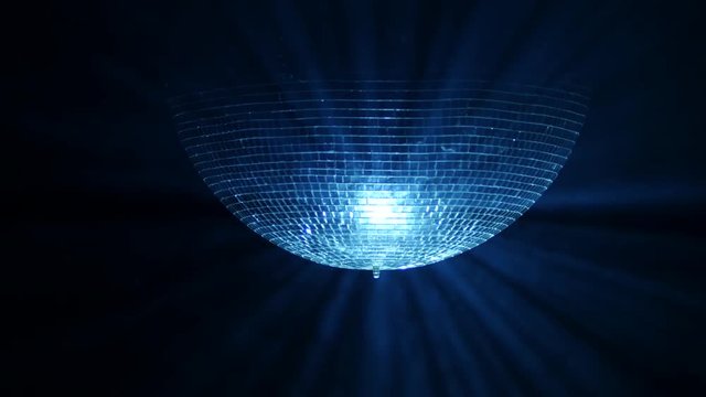 3D Disco mirror ball reflecting lights in smoke on black background