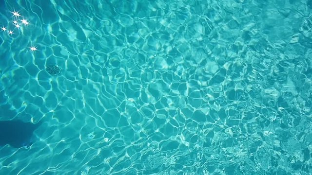Overhead view of swimming pool in slow motion