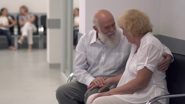Adult couple in the hall of the hospital