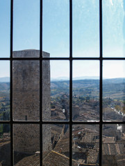from window, top view of san gimignano, tuscany, italy.