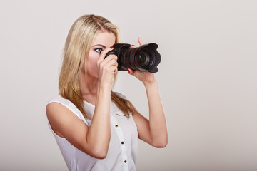 Photographer girl shooting images