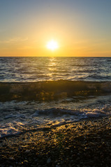 Amazing sea sunset, the sun, waves, clouds