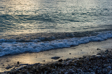 Amazing sea sunset, the sun, waves, clouds
