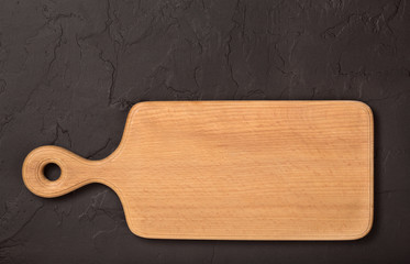 wooden board on black stone