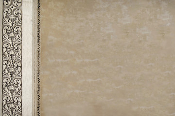  Light beige background with a pattern on the left side