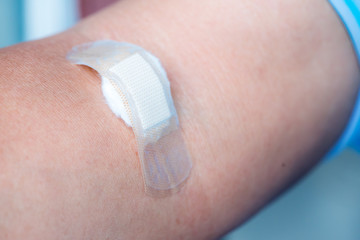 plaster close the wound from the blood at arm puncture,Medical and healthcare concept