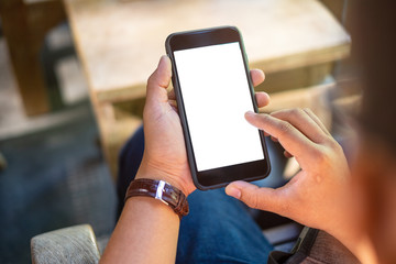 High angle shot of an unrecognizable businessman using a mobile phone