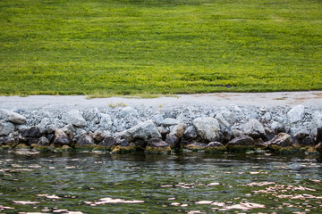 Fototapeta premium Mossy Rocks at the Lake