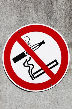 Sign no smoking cigarette and e cigarette on an industrial site