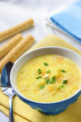 Cheese soup with chicken, potatoes and turmeric