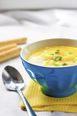 Cheese soup with chicken, potatoes and turmeric