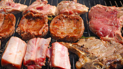 Roasted Juicy meat cooked over the coals on a barbecue