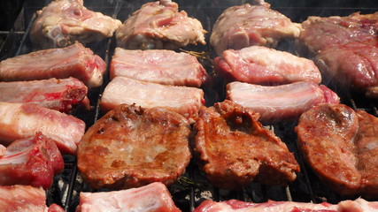 Roasted Juicy meat cooked over the coals on a barbecue