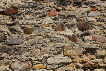 Old brick wall, background of bricks, stone masonry test with cement, blank for designer, pattern in a vintage style