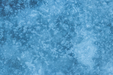 Texture of the ice surface. Winter background