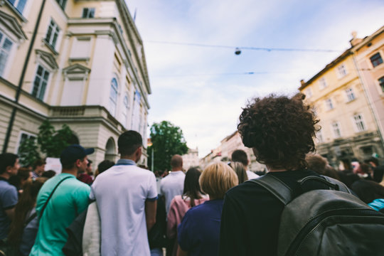 Back View Of Audience Watching Street Performance