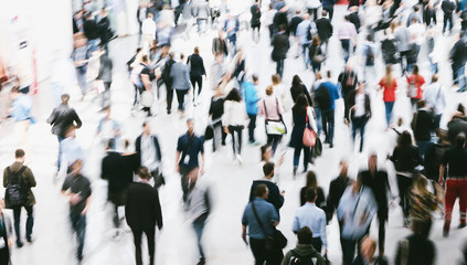 blurred people in a modern hall