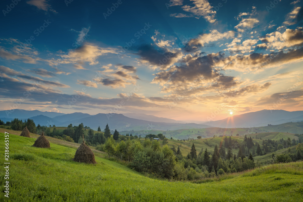 Wall mural majestic carpathian sunset in a summer mountain valley